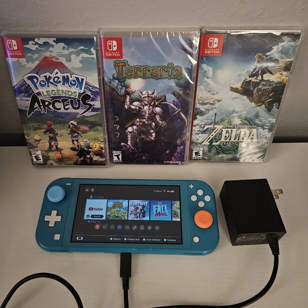Nintendo Switch Lite - Turquoise W/ 3 NEW games! Pokeman, Terraria, and Zelda!